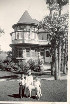 Three of the Nickle grandchildren in front of the Nickle's Elbow Park home, ca. 1944