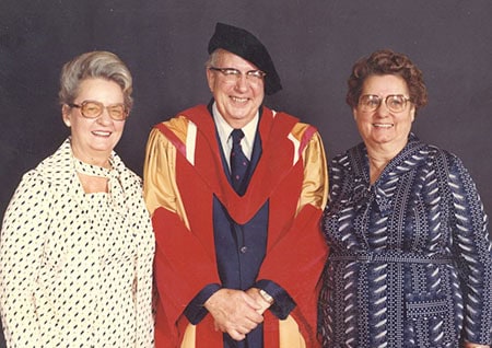 Carl Nickle, on being awarded an honourary PhD by the University of Calgary, with sisters Olga and Agnes, 1979